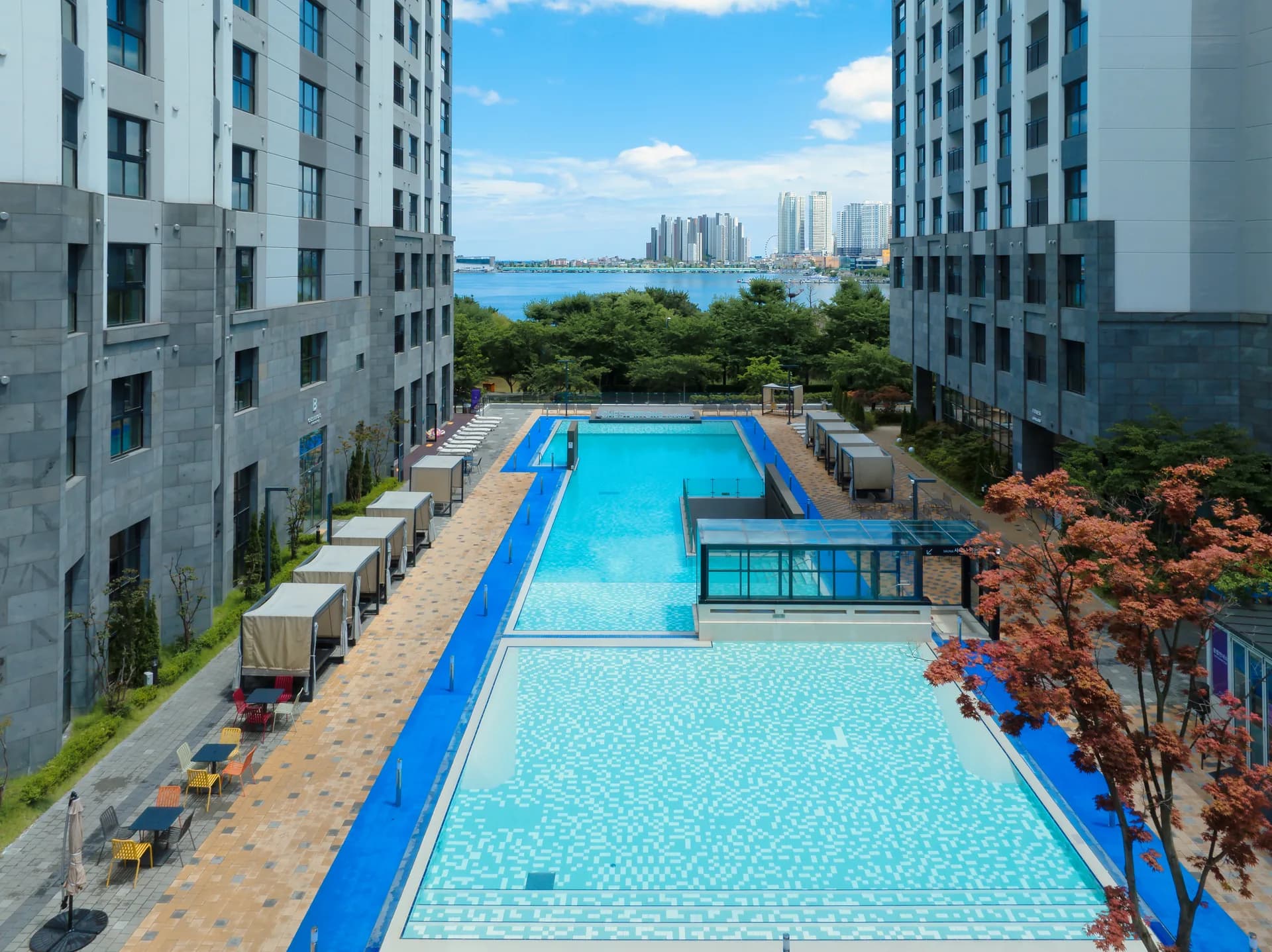 Heated outdoor onsen pool — central plaza, ground floor, April–October