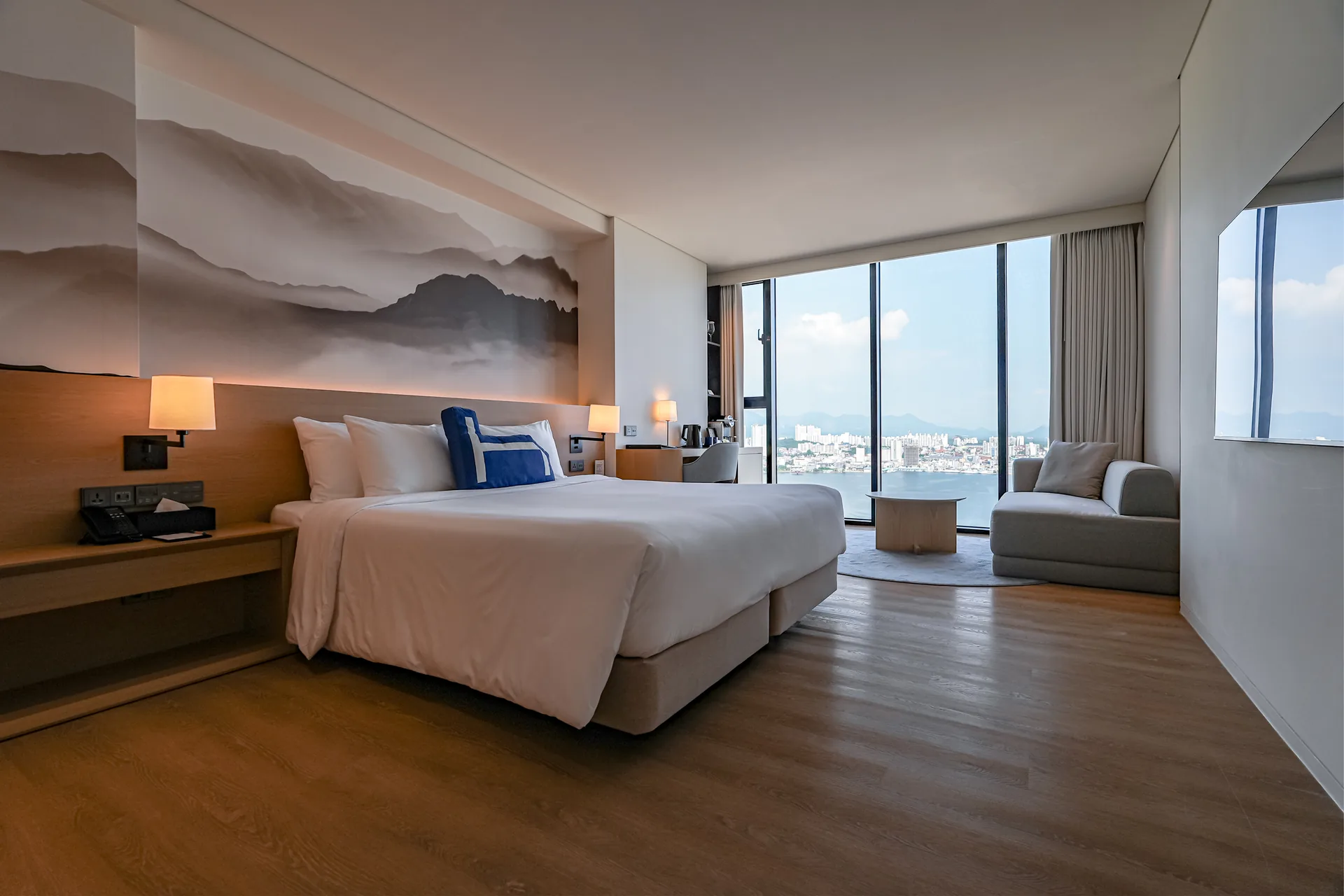 Every room ships with a Simmons Beautyrest Black bed and Nespresso Zenius
